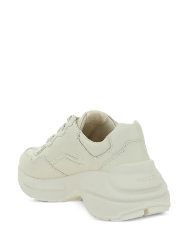 Gucci
Rhyton logo-print sneakers